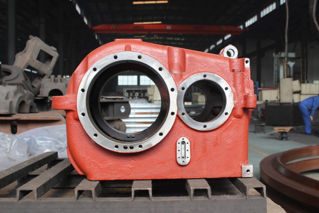 Finished large heavy casting gearbox housing machined on a CNC gantry machining center