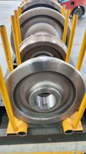 Railway wheels after shot blasting with clean and uniform metallic surface finish