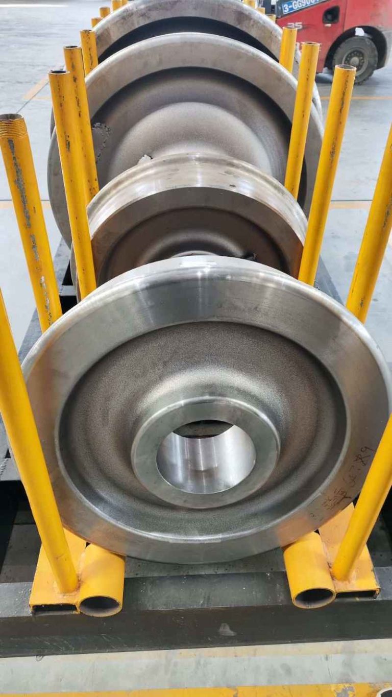 Railway wheels after shot blasting with clean and uniform metallic surface finish
