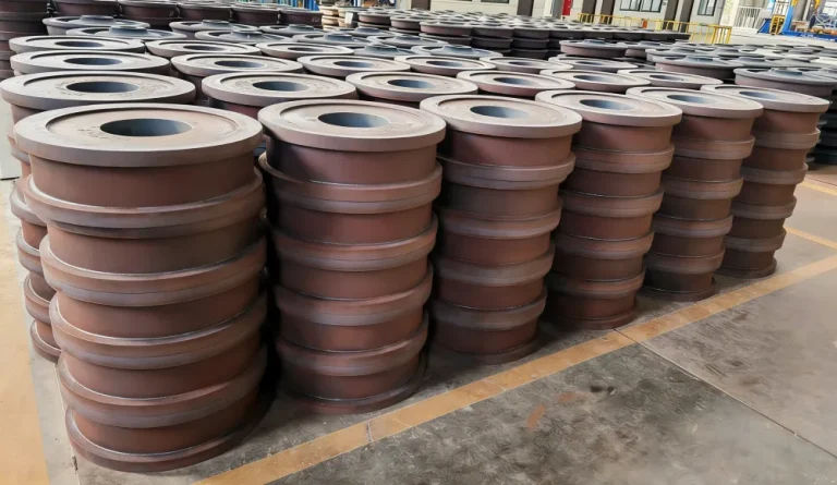 Multiple Double-Flange Railway Wheels stored in a workshop