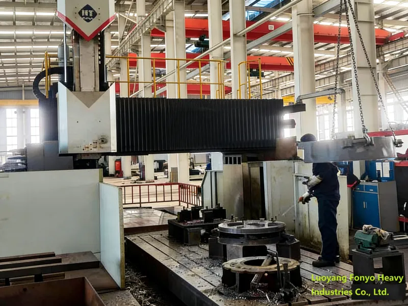 Machinist operating a heavy-duty gantry machining center for precision heavy casting components milling