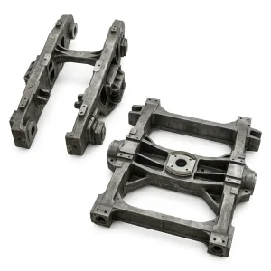 Cast steel railway bogie side frames and bolsters for freight wagon, showing left side frame and right bolster component
