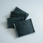 Rubber rail pad used in railway fastening systems for vibration damping and sleeper protection.