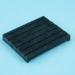 Rubber rail pad used in railway fastening systems for vibration damping and sleeper protection.