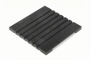 Rubber rail pad used in railway fastening systems for vibration damping and sleeper protection.