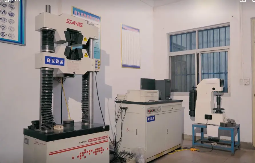 Why Do Railway Component Fail Even When the Material Meets the Specification? 2 mechanical properties inspection Lab technicians performing tensile strength and hardness tests on metal samples